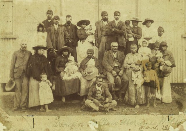 Group of unnamed Aboriginal men women & children at St Clair near Singleton, first AIM station 1903. SLNSW